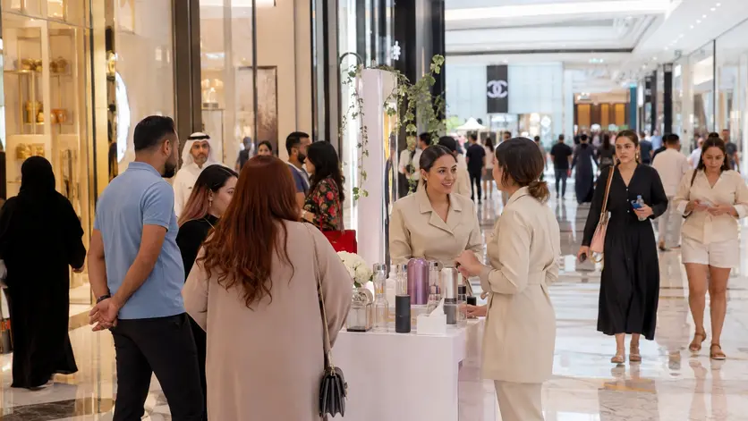 Luxury retail brand activation attracting shoppers inside Dubai Mall