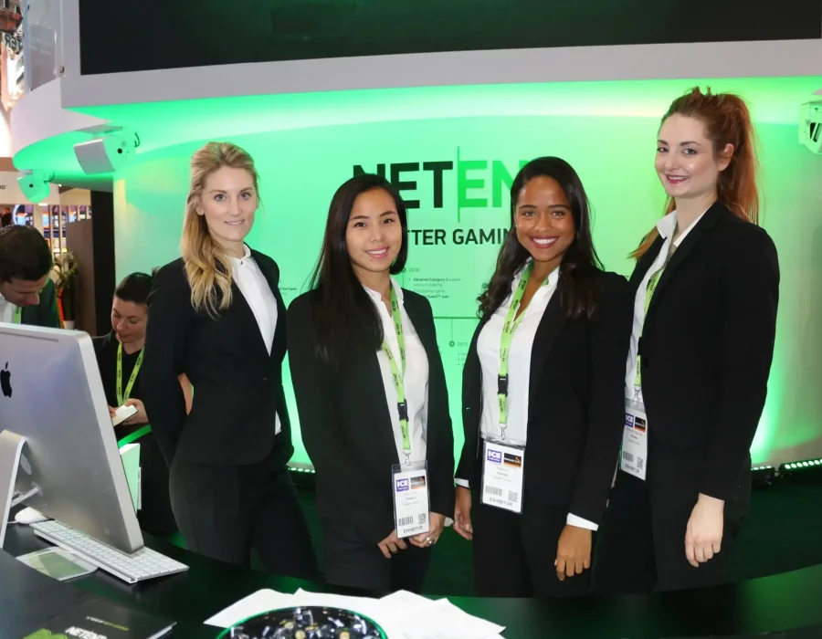 Diverse nationality event staff team at exhibition booth in Dubai