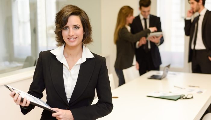 business-woman-with-papers-hands-scaled.jpg