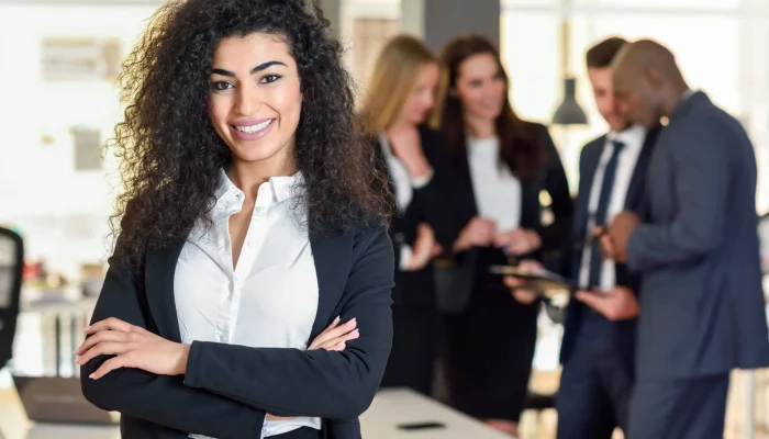 businesswoman-leader-modern-office-with-businesspeople-workin-scaled.jpg